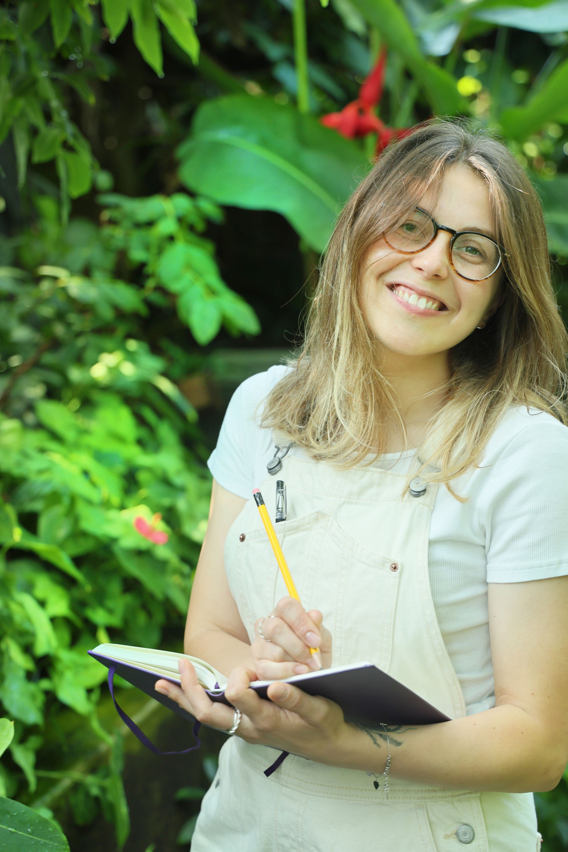 Woman botanist at work in a botanical garden